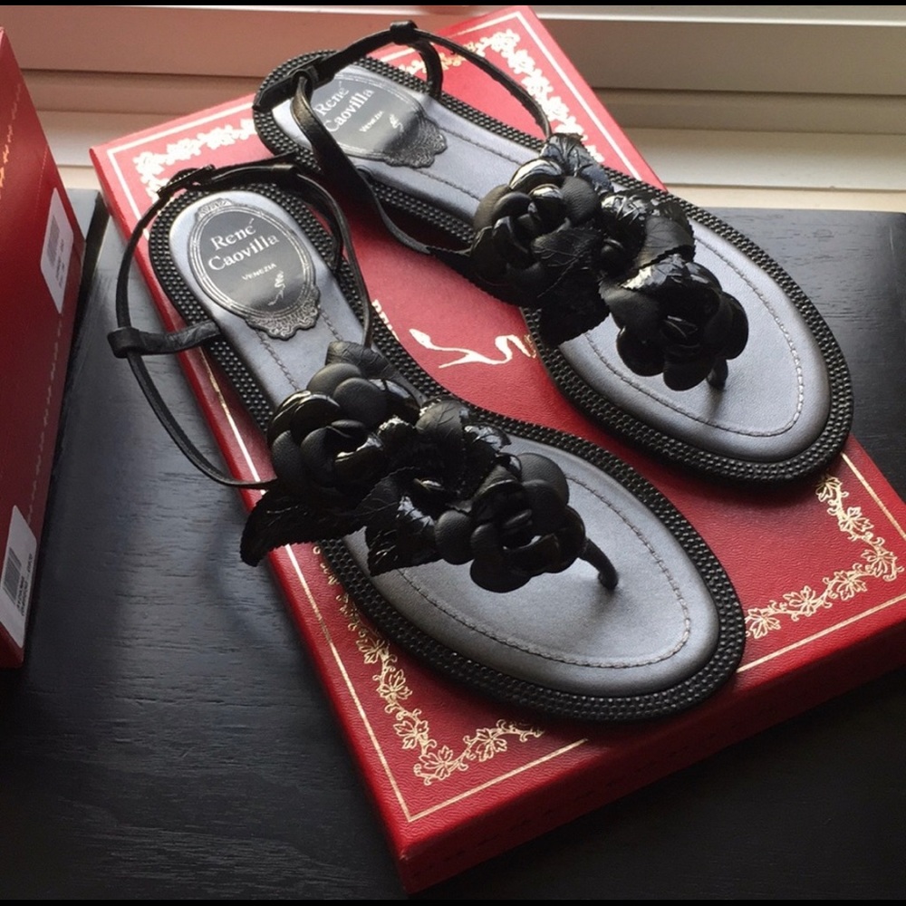 Black leather sandals. Dress up or down.